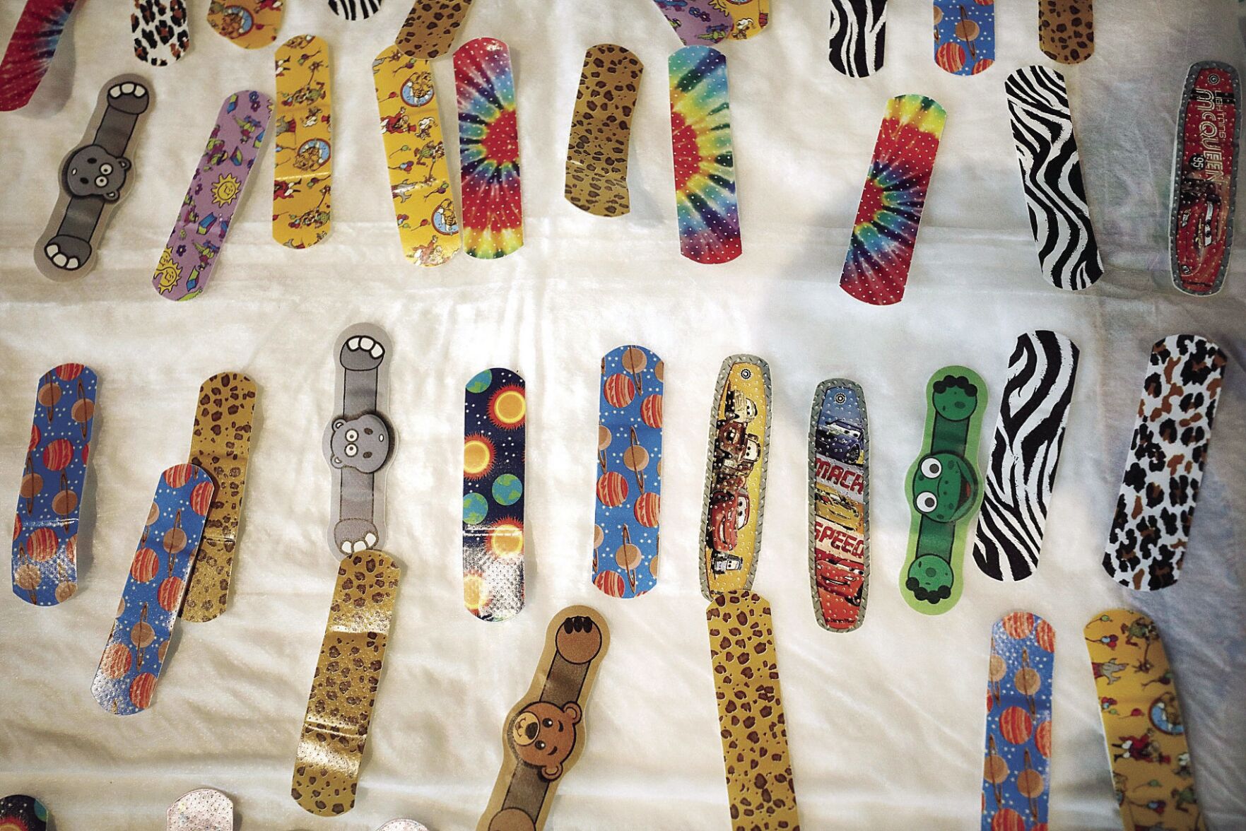 table of colorful kids bandages
